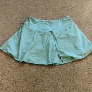 Green tennis skirt with shorts inside